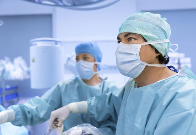 Surgeon performing back surgery