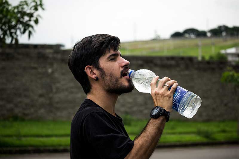 guy drinking water