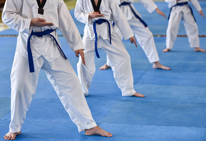 Teens in a taekwondo class