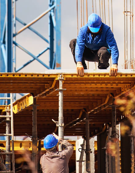 construction workers working on a building