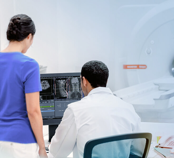 Doctor and nurse reviewing diagnostic imaging result