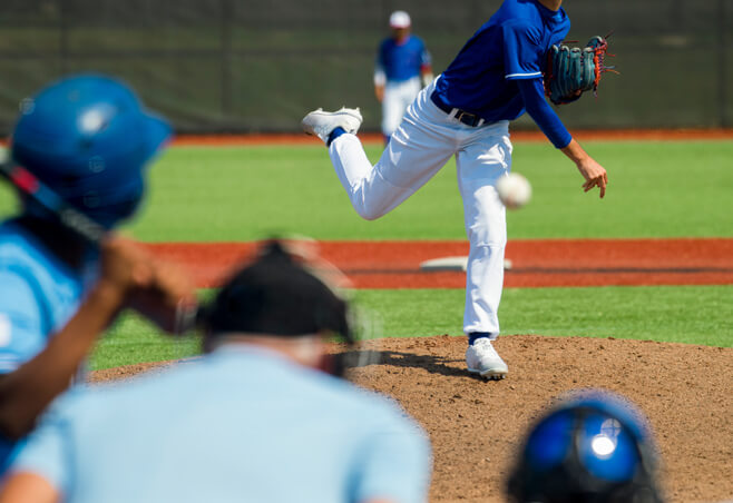 Baseball player pitches ball despite having inner elbow pain