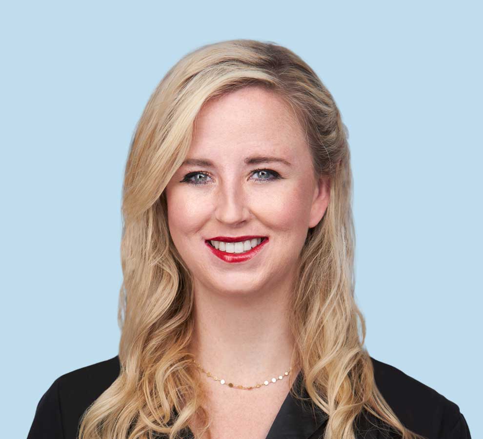 Cassandra Ricketts, MD professional headshot wearing black suit jacket