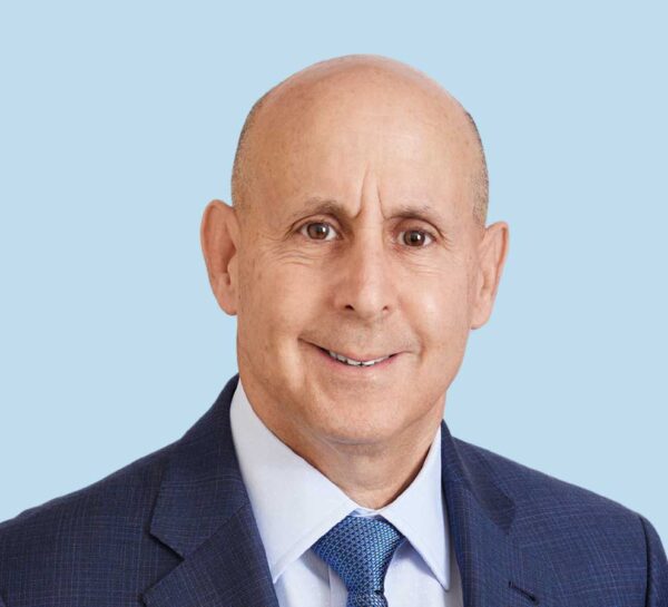 Craig Schwartz, MD professional headshot wearing blue suit