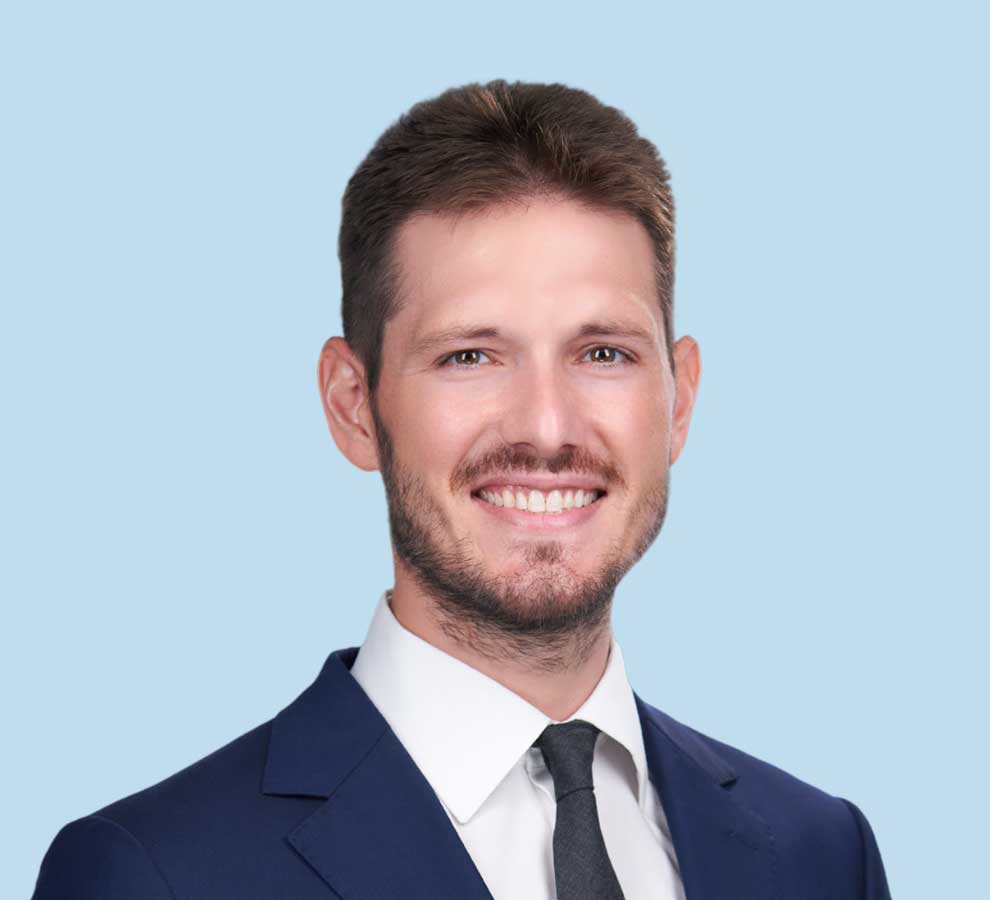 Jeffrey T. Kannen, DO professional headshot wearing navy blue suit and black tie