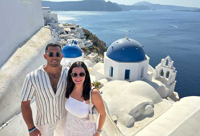 Dr. Joseph D'Alonzo on the steps of Santorini with his wife