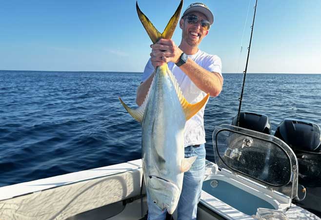 Dr. Joshua Linnell caught a large fish