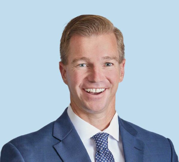 Patrick Smith, MD professional headshot wearing blue suit