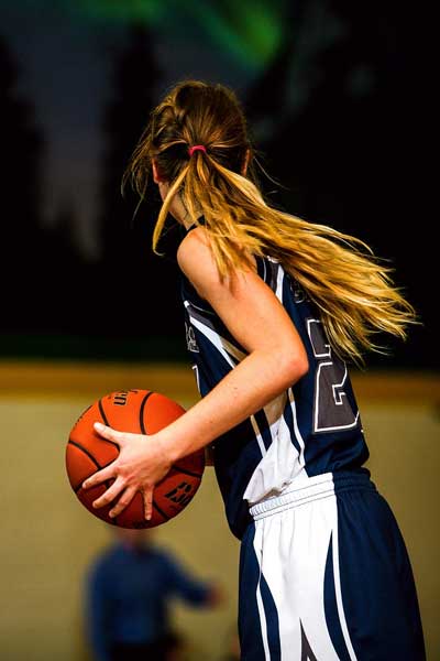 athlete with basketball