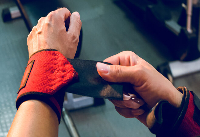 Woman wearing brace to protect joint from wrist sports injury