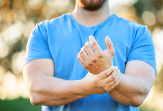 Man with a grade 1 wrist sprain